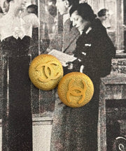CHANEL Textured Button Earrings