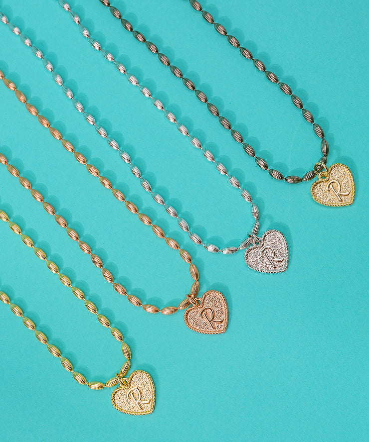 (L) Heart Initial Charm in Three Finishes